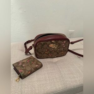 COACH floral purse with matching wallet.